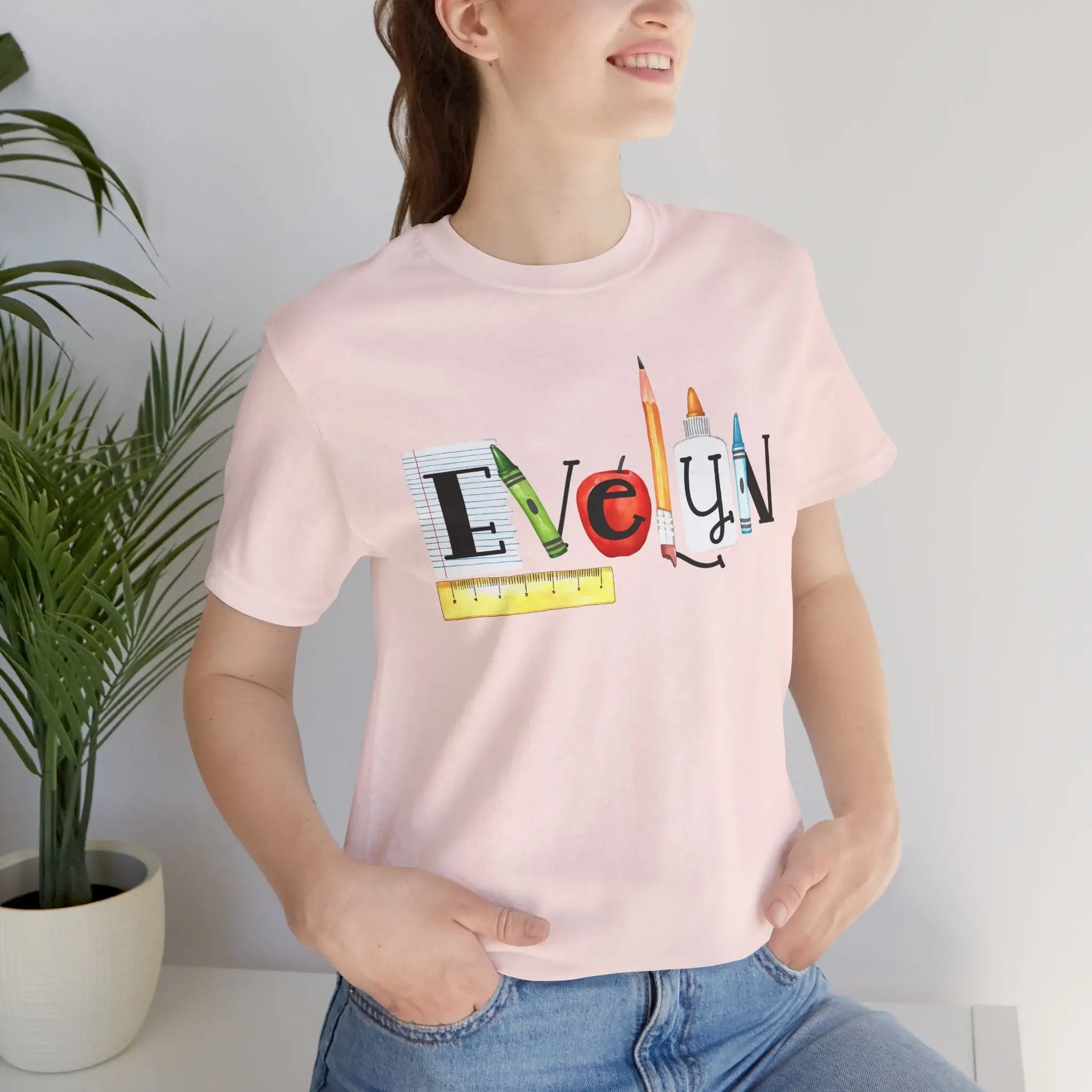 Teacher Back-to-School Name T-Shirt — Colorful School Supply Letter Design Printify