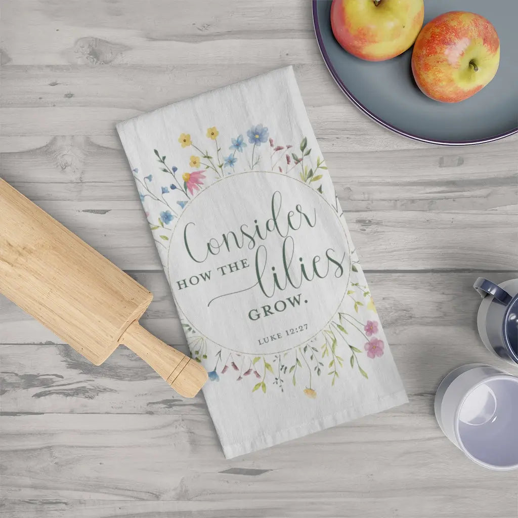 Consider the Lilies Scripture Kitchen Tea Towel Printify